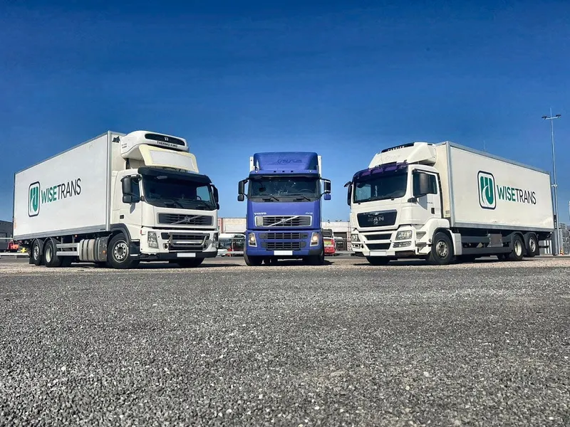 WiseTrans trucks in a car park