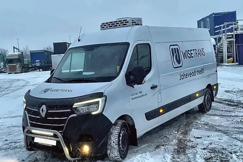 WiseTrans van with a refrigeration unit in a yard